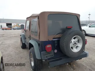 1998 Jeep Wrangler SE with VIN 1J4FY29P9WP792089, listed as a IAAI auction lot 41794793 with 200,838 mi miles. Bid and sale history available at carsss.com. Image 6.