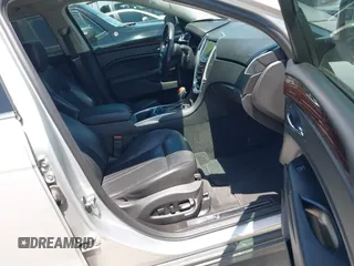 2015 Cadillac SRX Luxury Collection z VIN 3GYFNBE35FS627640, wystawiony jako IAAI lot #42262843 z przebiegiem 211 669 mil mil oraz . Historia ofert i sprzedaży dostępna na DreamBid. Obrazek 5.