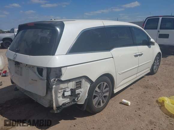 2016 Honda Odyssey Touring Elite with VIN 5FNRL5H98GB102544, listed as a IAAI auction lot 42040050 with 128,957 mi miles and . Bid and sale history available at DreamBid. Image 4.
