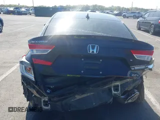 2020 Honda Accord EX-L with VIN 1HGCV2F57LA004141, listed as a IAAI auction lot 42136007 with 105,352 mi miles and . Bid and sale history available at DreamBid. Image 16.