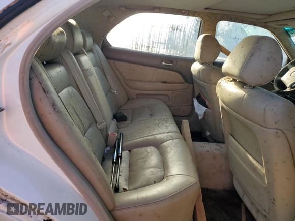 2000 Lexus LS 400 z VIN JT8BH28F0Y0175297, wystawiony jako Copart lot #75230834 z przebiegiem 293 851 mil mil oraz Szkoda całkowita • Salvage title. Historia ofert i sprzedaży dostępna na DreamBid. Obrazek 10.