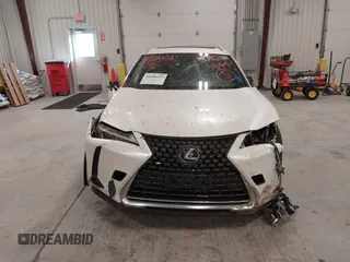 2021 Lexus UX 250h z VIN JTHP9JBHXM2041595, wystawiony jako IAAI lot #41046223 z przebiegiem 27 773 mil mil oraz . Historia ofert i sprzedaży dostępna na DreamBid. Obrazek 13.