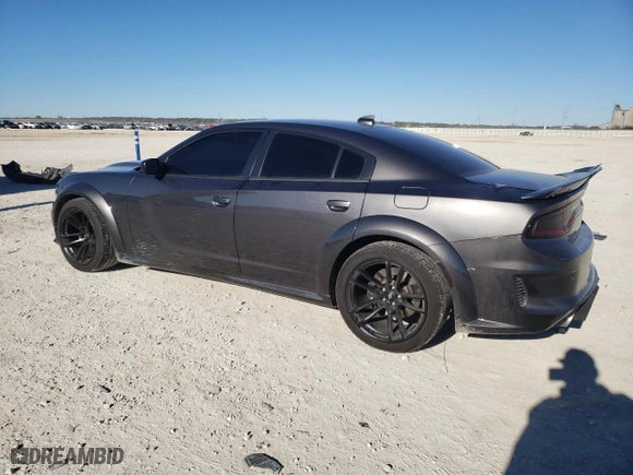 2023 Dodge Charger Scat Pack Widebody with VIN 2C3CDXGJ9PH651887, listed as a Copart auction lot 42554645 with 9,778 mi miles and Clean Title. Bid and sale history available at carsss.com. Image 2.