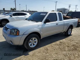 2001 Nissan Frontier XE with VIN 1N6DD26S51C326237, listed as a Copart auction lot 64792455 with 166,315 mi miles and Salvage title. Bid and sale history available at DreamBid. Image 1.