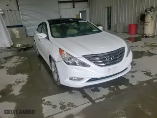 2013 Hyundai Sonata SE with VIN 5NPEC4AC1DH584947, listed as a Copart auction lot 52923195 with 131,539 mi miles and Salvage Title. Bid and sale history available at carsss.com. Image 14.