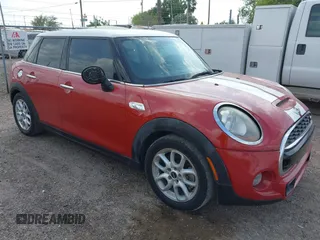 2016 MINI Cooper Hardtop 4 Door S with VIN WMWXU3C56G2D30140, listed as a IAAI auction lot 41883406 with 120,705 mi miles. Bid and sale history available at carsss.com. Image 1.