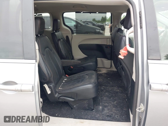 2020 Chrysler Pacifica Touring L with VIN 2C4RC1BG2LR127986, listed as a IAAI auction lot 42419518 with 107,618 mi miles and . Bid and sale history available at DreamBid. Image 8.