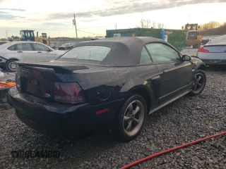 2003 Ford Mustang GT Deluxe with VIN 1FAFP45X93F421743, listed as a Copart auction lot 88043455 with 142,152 mi miles and Salvage Title. Bid and sale history available at carsss.com. Image 3.