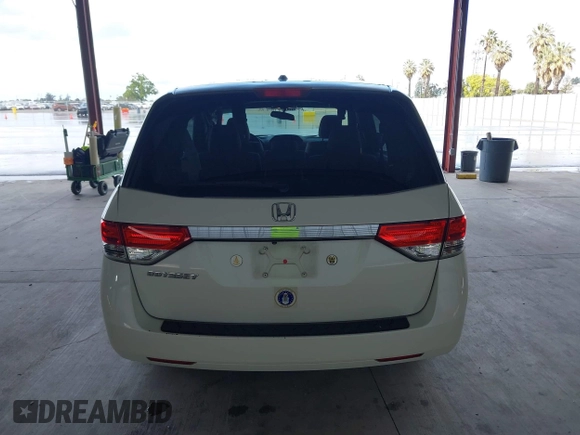 2015 Honda Odyssey EX-L with VIN 5FNRL5H64FB084175, listed as a IAAI auction lot 41943540 with 67,902 mi miles and . Bid and sale history available at carsss.com. Image 16.