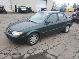 2001 Mazda Protege DX with VIN JM1BJ222910404111, listed as a Copart auction lot 88333775 with 171,876 mi miles and Salvage Title. Bid and sale history available at DreamBid. Image 1.