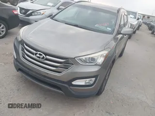 2016 Hyundai Santa Fe z VIN 5XYZU3LB3GG370826, wystawiony jako IAAI lot #42325158 z przebiegiem 146 916 mil mil oraz . Historia ofert i sprzedaży dostępna na DreamBid. Obrazek 17.