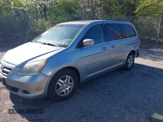 2007 Honda Odyssey EX-L with VIN 5FNRL38787B019019, listed as a IAAI auction lot 41974224 with 170,706 mi miles. Bid and sale history available at carsss.com. Image 2.