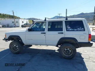 1997 Jeep Cherokee SE with VIN 1J4FJ28S7VL553270, listed as a IAAI auction lot 41825524 with 157,015 mi miles. Bid and sale history available at carsss.com. Image 14.