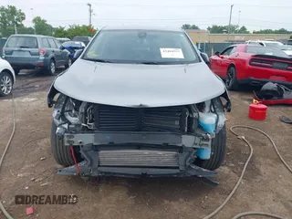 2023 Chevrolet Equinox LT with VIN 3GNAXUEG4PS178128, listed as a IAAI auction lot 42484557 with 56,496 mi miles and . Bid and sale history available at DreamBid. Image 6.