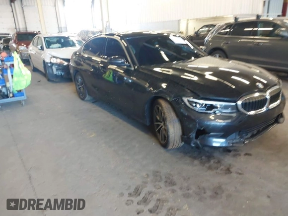 2021 BMW 3 Series 330i with VIN 3MW5R1J06M8C17805, listed as a IAAI auction lot 41736509 with 60,811 mi miles. Bid and sale history available at carsss.com. Image 1.