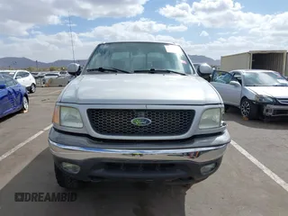 2003 Ford F-150 XLT with VIN 1FTRW08LX3KC79700, listed as a IAAI auction lot 41680562 with 131,052 mi miles. Bid and sale history available at carsss.com. Image 13.