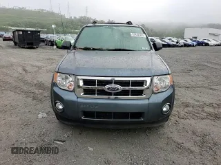 2012 Ford Escape XLT z VIN 1FMCU9D75CKA05373, wystawiony jako Copart lot #63442495 z przebiegiem 117 756 mil mil oraz Szkoda całkowita • Salvage title. Historia ofert i sprzedaży dostępna na DreamBid. Obrazek 14.