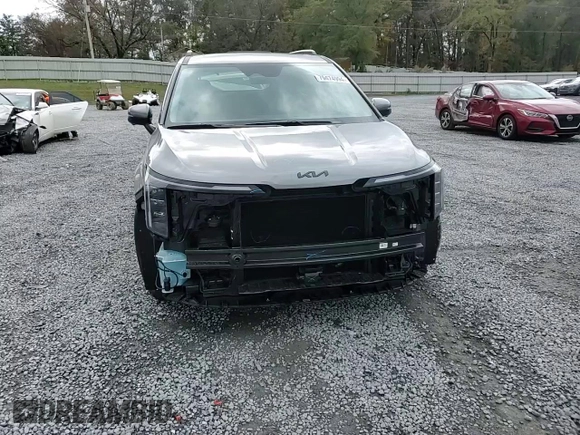 2025 Kia Carnival SX Prestige with VIN KNDNE5K33S6479557, listed as a Copart auction lot 79474994 with 327 mi miles and Salvage Title. Bid and sale history available at DreamBid. Image 12.