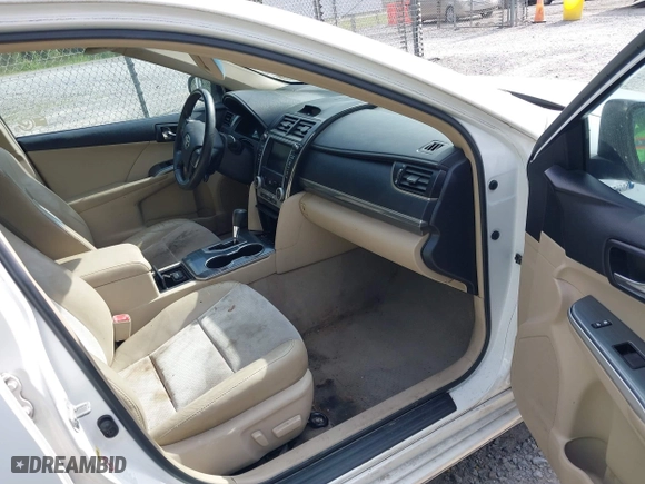 2012 Toyota Camry Hybrid XLE with VIN 4T1BD1FKXCU030157, listed as a IAAI auction lot 42040131 with 237,412 mi miles. Bid and sale history available at carsss.com. Image 5.