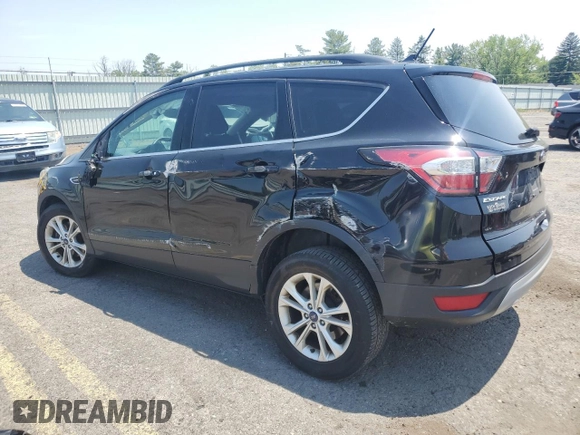 2018 Ford Escape SE z VIN 1FMCU9GD3JUA78244, wystawiony jako Copart lot #59508955 z przebiegiem 108 273 mil mil oraz Szkoda całkowita • Salvage title. Historia ofert i sprzedaży dostępna na DreamBid. Obrazek 2.