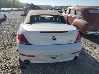 2010 BMW 6 Series 650i z VIN WBAEB5C50AC224807, wystawiony jako Copart lot #73411584 z przebiegiem 112 734 mil mil oraz Szkoda całkowita • Salvage title. Historia ofert i sprzedaży dostępna na DreamBid. Obrazek 6.
