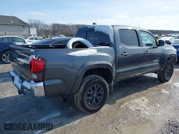 2023 Toyota Tacoma 4WD SR with VIN 3TMCZ5AN3PM636445, listed as a IAAI auction lot 41552835 with 19,955 mi miles. Bid and sale history available at carsss.com. Image 4.