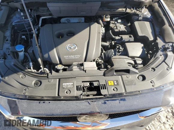2018 Mazda CX-5 Grand Touring with VIN JM3KFADM4J1341740, listed as a Copart auction lot 46805955 with 99,114 mi miles and Salvage Title. Bid and sale history available at DreamBid. Image 12.