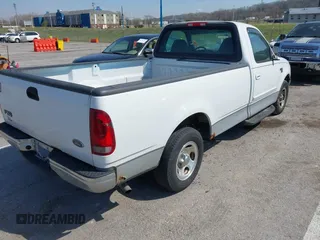 2002 Ford F-150 XL with VIN 1FTRF17W72NA67786, listed as a IAAI auction lot 41869585 with 180,262 mi miles. Bid and sale history available at carsss.com. Image 4.