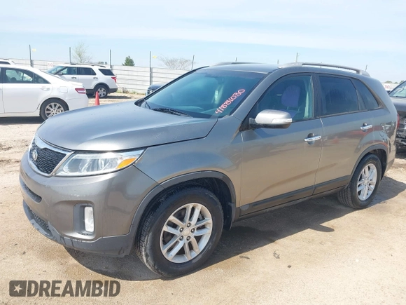 2014 Kia Sorento LX with VIN 5XYKT4A76EG462311, listed as a IAAI auction lot 41884030 with 139,030 mi miles and . Bid and sale history available at carsss.com. Image 2.