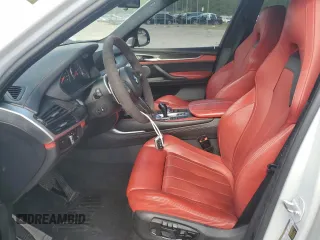 2016 BMW X5 M z VIN 5YMKT6C52G0R79404, wystawiony jako Copart lot #54587105 z przebiegiem 89 465 mil mil oraz Szkoda całkowita • Salvage title. Historia ofert i sprzedaży dostępna na DreamBid. Obrazek 7.