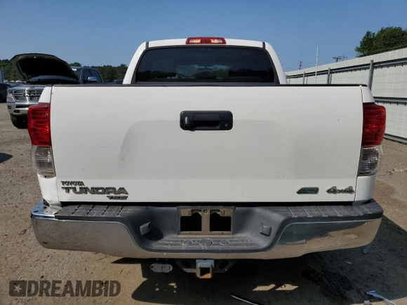 2013 Toyota Tundra z VIN 5TFDW5F11DX295393, wystawiony jako Copart lot #53049515 z przebiegiem 204 926 mil mil oraz Szkoda całkowita • Salvage title. Historia ofert i sprzedaży dostępna na DreamBid. Obrazek 6.