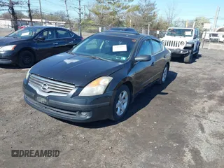 2007 Nissan Altima 2.5 S with VIN 1N4AL21E47N497414, listed as a IAAI auction lot 42050123 with 143,339 mi miles. Bid and sale history available at carsss.com. Image 2.