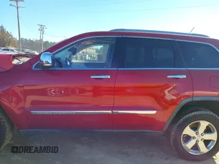 2011 Jeep Grand Cherokee Limited z VIN 1J4RR5GG0BC703946, wystawiony jako IAAI lot #41341735 z przebiegiem 139 389 mil mil oraz . Historia ofert i sprzedaży dostępna na DreamBid. Obrazek 14.
