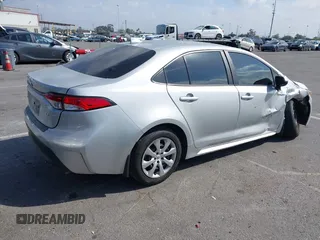 2023 Toyota Corolla LE with VIN 5YFB4MDEXPP042461, listed as a IAAI auction lot 41914637 with 66,651 mi miles. Bid and sale history available at carsss.com. Image 4.