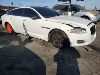 2014 Jaguar XJ with VIN SAJWA2GZ9E8V71794, listed as a Copart auction lot 74347574 with 106,172 mi miles and Clean Title. Bid and sale history available at carsss.com. Image 4.