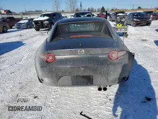 2024 Mazda MX-5 Miata Grand Touring z VIN JM1NDAM73R0607806, wystawiony jako Copart lot #88531435 z przebiegiem 3 089 mil mil oraz Szkoda całkowita • Salvage title. Historia ofert i sprzedaży dostępna na DreamBid. Obrazek 6.