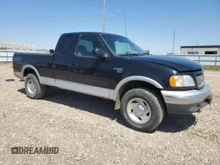 2000 Ford F-150 XL with VIN 2FTRX18L2YCA62429, listed as a Copart auction lot 56033895 with 180,156 mi miles and Non repairable. Bid and sale history available at DreamBid. Image 4.