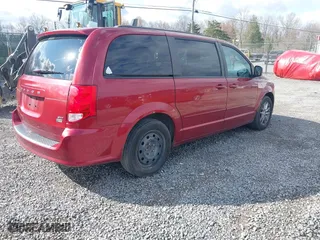 2015 Dodge Grand Caravan SXT with VIN 2C4RDGCG6FR536205, listed as a IAAI auction lot 42025761 with 171,416 mi miles. Bid and sale history available at carsss.com. Image 4.