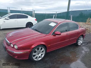 2005 Jaguar X-Type 3.0L with VIN SAJWA51A05WE55760, listed as a IAAI auction lot 41732516 with NaN miles. Bid and sale history available at carsss.com. Image 18.