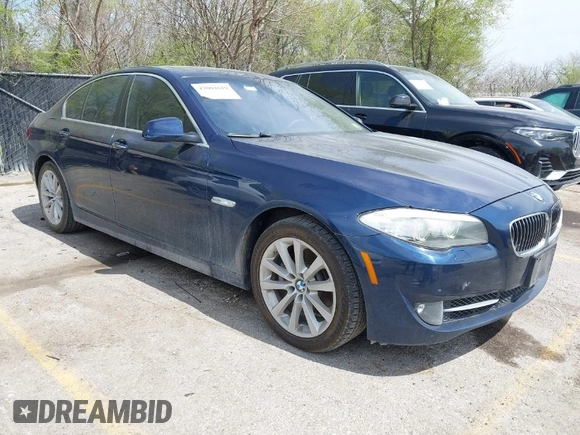 2013 BMW 5 Series 528i xDrive with VIN WBAXH5C52DD107297, listed as a IAAI auction lot 42004619 with 182,805 mi miles. Bid and sale history available at carsss.com. Image 1.
