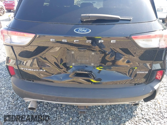 2020 Ford Escape Titanium Hybrid z VIN 1FMCU9DZ9LUC35844, wystawiony jako IAAI lot #42058275 z przebiegiem 74 205 mil mil oraz . Historia ofert i sprzedaży dostępna na DreamBid. Obrazek 6.