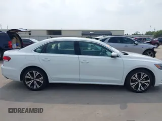 2021 Volkswagen Passat SE z VIN 1VWSA7A32MC014376, wystawiony jako IAAI lot #42314372 z przebiegiem 81 209 mil mil oraz . Historia ofert i sprzedaży dostępna na DreamBid. Obrazek 13.