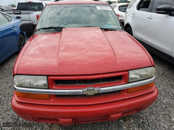 2002 Chevrolet Blazer LS with VIN 1GNCS18W12K162353, listed as a Copart auction lot 73874774 with 0 mi miles and Salvage Title. Bid and sale history available at carsss.com. Image 5.