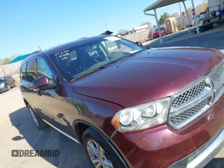 2012 Dodge Durango Crew with VIN 1C4RDHDG9CC330644, listed as a IAAI auction lot 41889758 with 194,295 mi miles and . Bid and sale history available at DreamBid. Image 1.