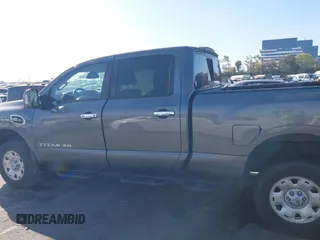 2021 Nissan Titan SV with VIN 1N6AA1FA6MN529806, listed as a IAAI auction lot 41859992 with 50,729 mi miles and . Bid and sale history available at DreamBid. Image 14.
