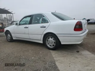 2000 Mercedes-Benz C 230 Kompressor with VIN WDBHA24G1YF946926, listed as a Copart auction lot 70884494 with 115,791 mi miles and Salvage Title. Bid and sale history available at carsss.com. Image 2.