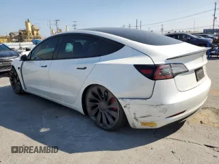 2021 Tesla Model 3 Performance z VIN 5YJ3E1EC1MF075451, wystawiony jako Copart lot #60354235 z przebiegiem 52 662 mil mil oraz Szkoda całkowita • Salvage title. Historia ofert i sprzedaży dostępna na DreamBid. Obrazek 2.