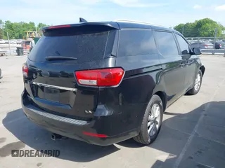 2015 Kia Sedona LX with VIN KNDMB5C17F6069139, listed as a IAAI auction lot 42064125 with 226,244 mi miles and . Bid and sale history available at DreamBid. Image 4.