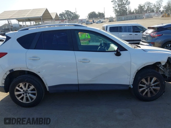 2013 Mazda CX-5 Sport with VIN JM3KE2BE4D0153251, listed as a IAAI auction lot 42297235 with 177,019 mi miles and . Bid and sale history available at DreamBid. Image 13.