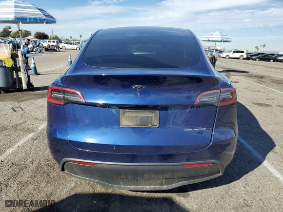 2023 Tesla Model Y Long Range with VIN 7SAYGDEEXPF814469, listed as a Copart auction lot 45982675 with 52,053 mi miles and Salvage Title. Bid and sale history available at carsss.com. Image 6.